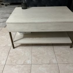 Coffee table with lift top