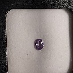 Lab made color change sapphire (alexandrite simulant purple to green)