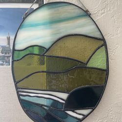 Stained glass coastal scene
