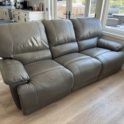 2 Gray Leather Reclining Couches With Ports 