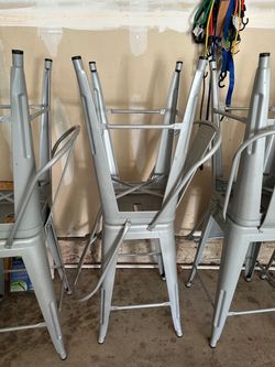 MOVE-OUT SALE — 12 Silver Metal Chairs