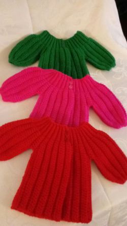 Baby girl sweaters, hand crafted, made with acrylic yarns, sizes vary from new born up up to 3months, New, $8 each.