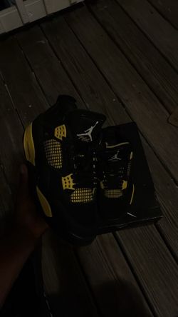 Yellow thunder Jordan 4s
