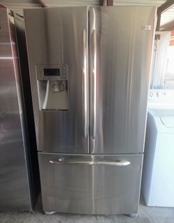 GE Stainless Steel Refrigerator And Freezer