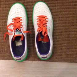 Mens Puma white leather size 10 green and purple sole worn once