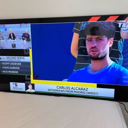 Selling a Samsung 55-inch Smart TV, model UN55TU7000. Manufactured May 2021.