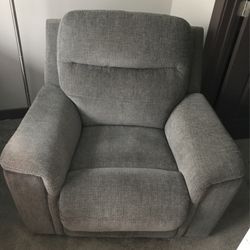 Grey Electric Recliner Both Back And Foot Is Adjustable Along With Built In Phone Charger