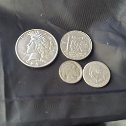Two dollars Dalla $.25 Canadian