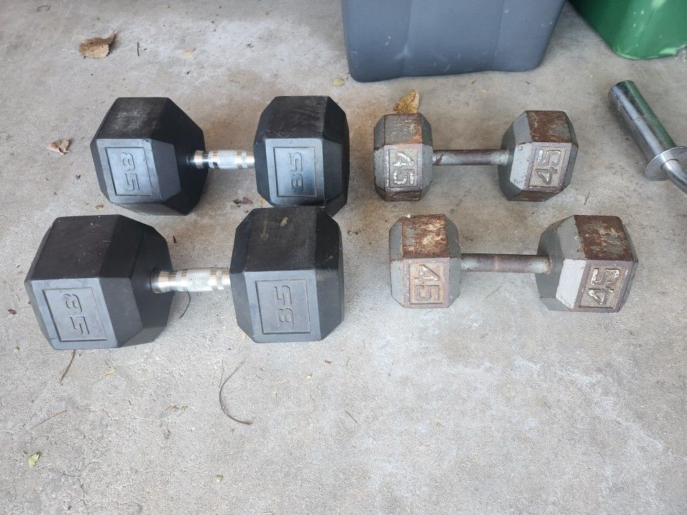 2 - 85lb dumbells. 2 - 45lb dumbells