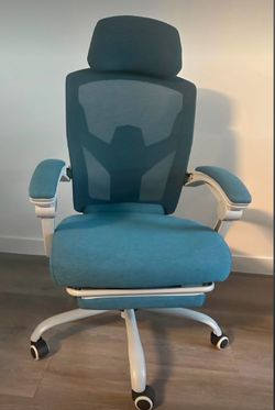 Like new computer chair with foot rest has alot of different settings. Only used a couple of times.