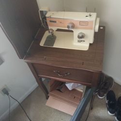 Vintage Sewing Machine And Table