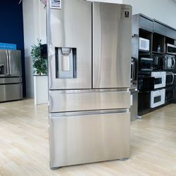Samsung 22.6-cu ft 4-Door Counter-Depth French Door Refrigerator with Ice Maker.