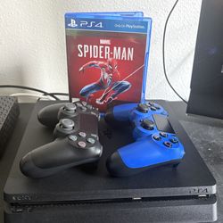 PS4 Slim 1TB 2 DualShock Controllers & Spider-Man Game