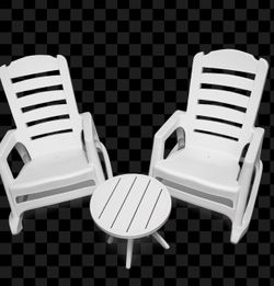 2 white resin rocker chairs and one metal table