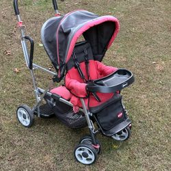 Joovy Caboose sit-and-stand double stroller.