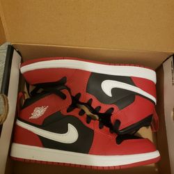Black & Red Nike Kid Shoe