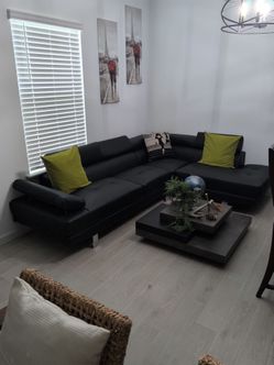 Black L- shaped couch in very good condition!