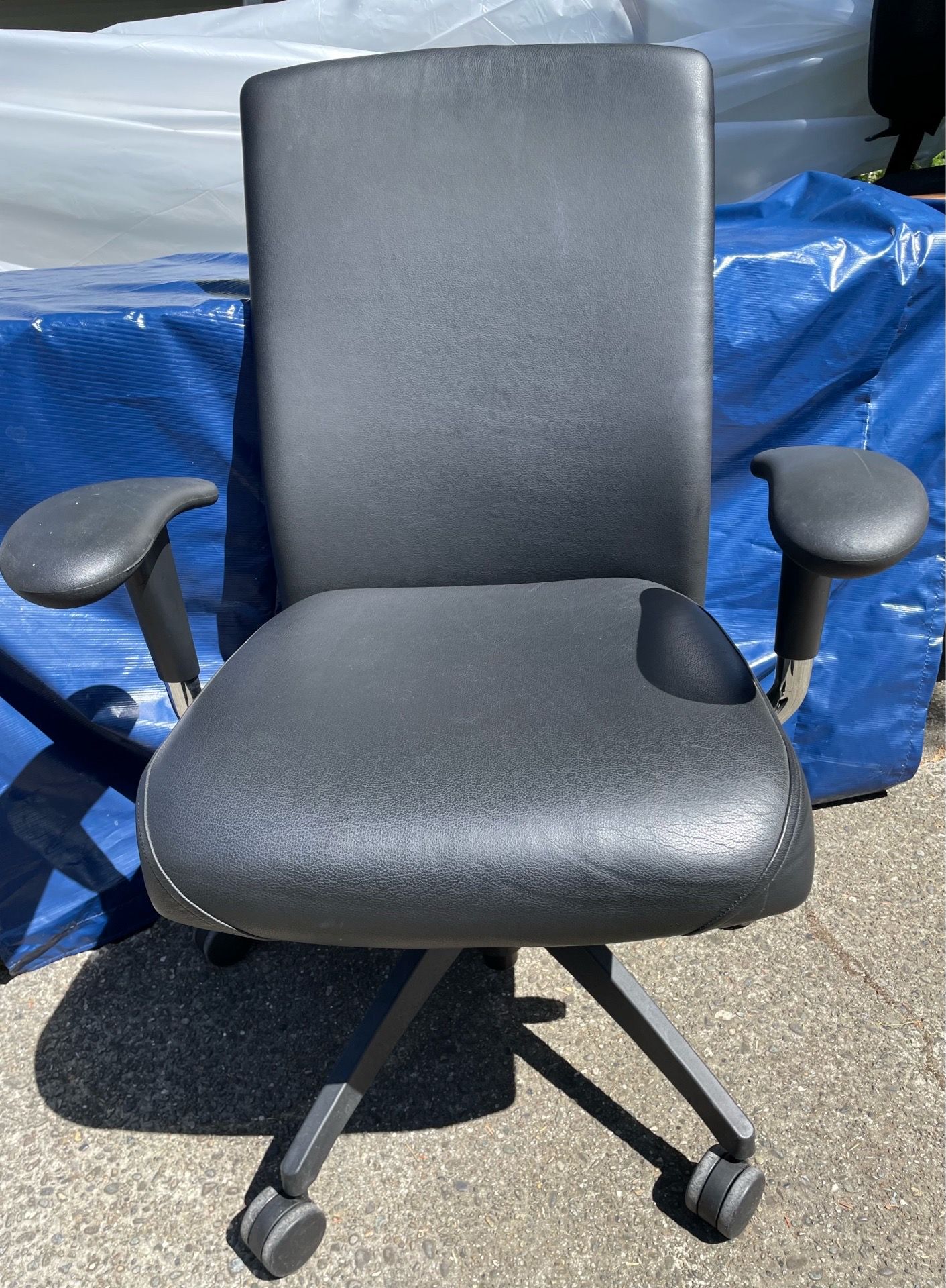 Black leather office chair. Northeast Tacoma near the Centre at Norpoint