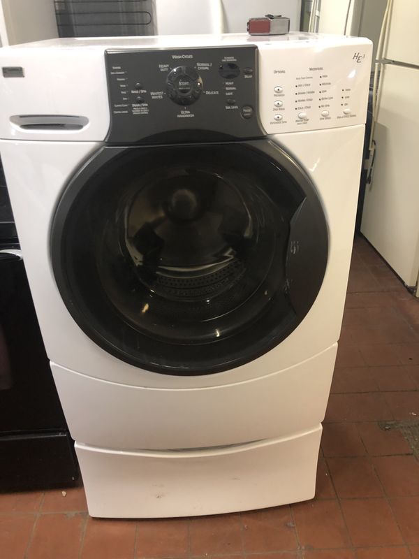 57X27X26 Kenmore Elite front load washer with pedestal/ Lavadora con