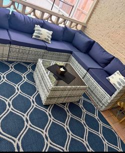 6-Piece Outdoor Wicker Sectional Sofa Set with Navy Blue Cushions-Delivery available
