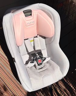 Nuna pink and gray car seat