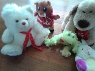 Box of stuffed animals . About 10 of them