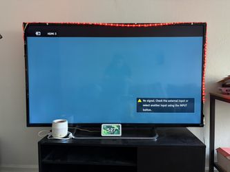 60 Inch Flatscreen TV.