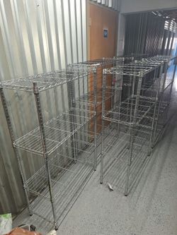 5 total Storage racks , adjustable,  brand new