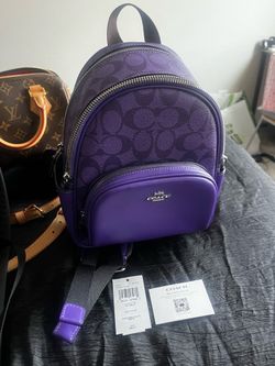 Coach purple court mini backpack