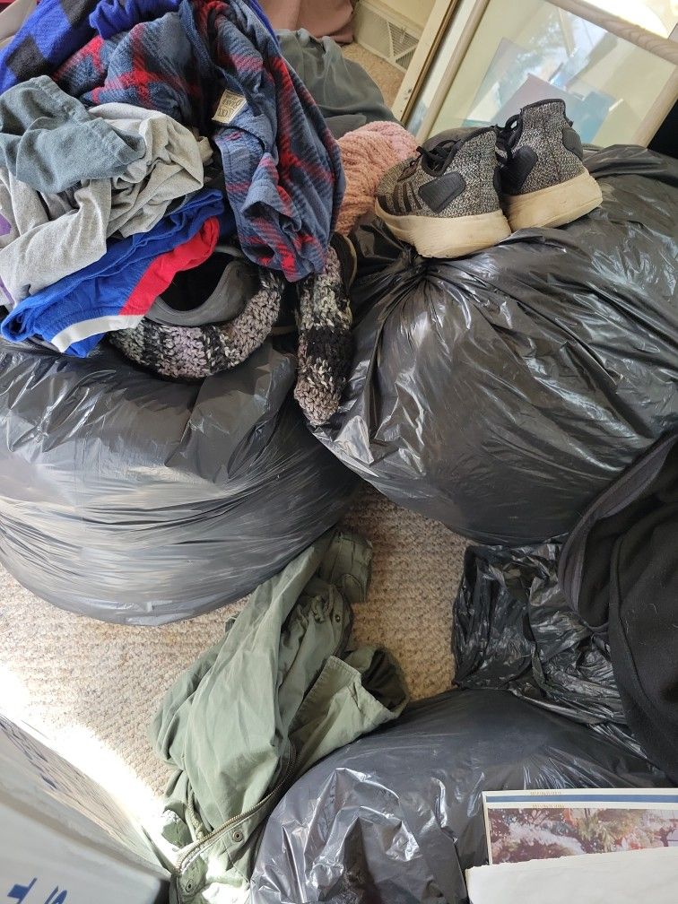 Bags Of Clothes And Worn Shoes, Men's And Womens