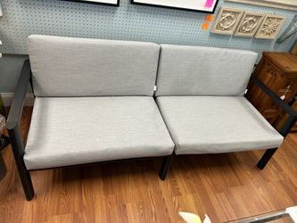 Large 6 foot metal plastic wicker woven outdoor sofa with cushions