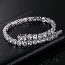 18k White Gold Platted CZ Tennis Bracelet, 4MM Cubic Zirconia Charm Bracelet For Men & Women. Unisex Bracelet. $40