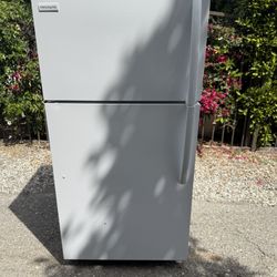 Frigidaire top and bottom fridge