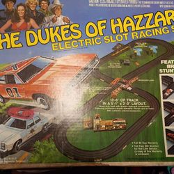 A VINTAGE 1981 Dukes Of Hazzard Electric Slot Racing Set
