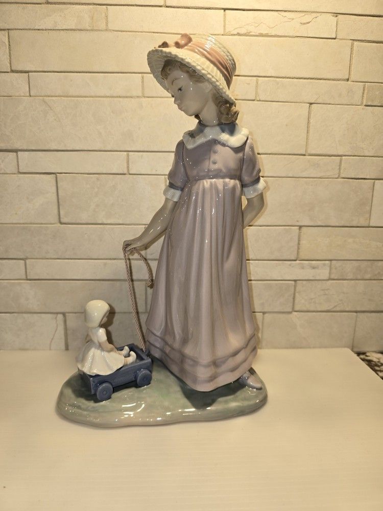 Lladro Girl Pulling Toy Wagon