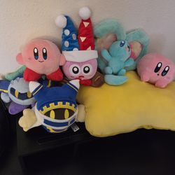 A Bunch of Kirby Plushies