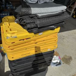 17 Large Bins With Tops And 20 Moving Blankets