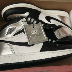 Brand New Silver High Top Jordans.