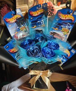 Bouquet of eternal roses and hotwheels