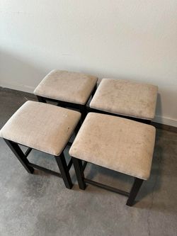 Four Matching saddle Stools