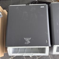 Motion detection paper towel dispenser