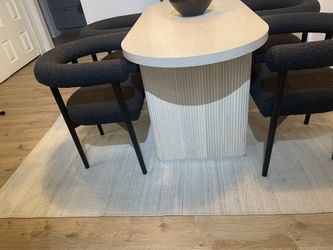 5’7” X 7’10” RUG- NO SHOES IN THE HOUSE