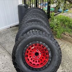 BFGoodrich 33x12.50R17LT Tires with Red Rims (Set of 5)