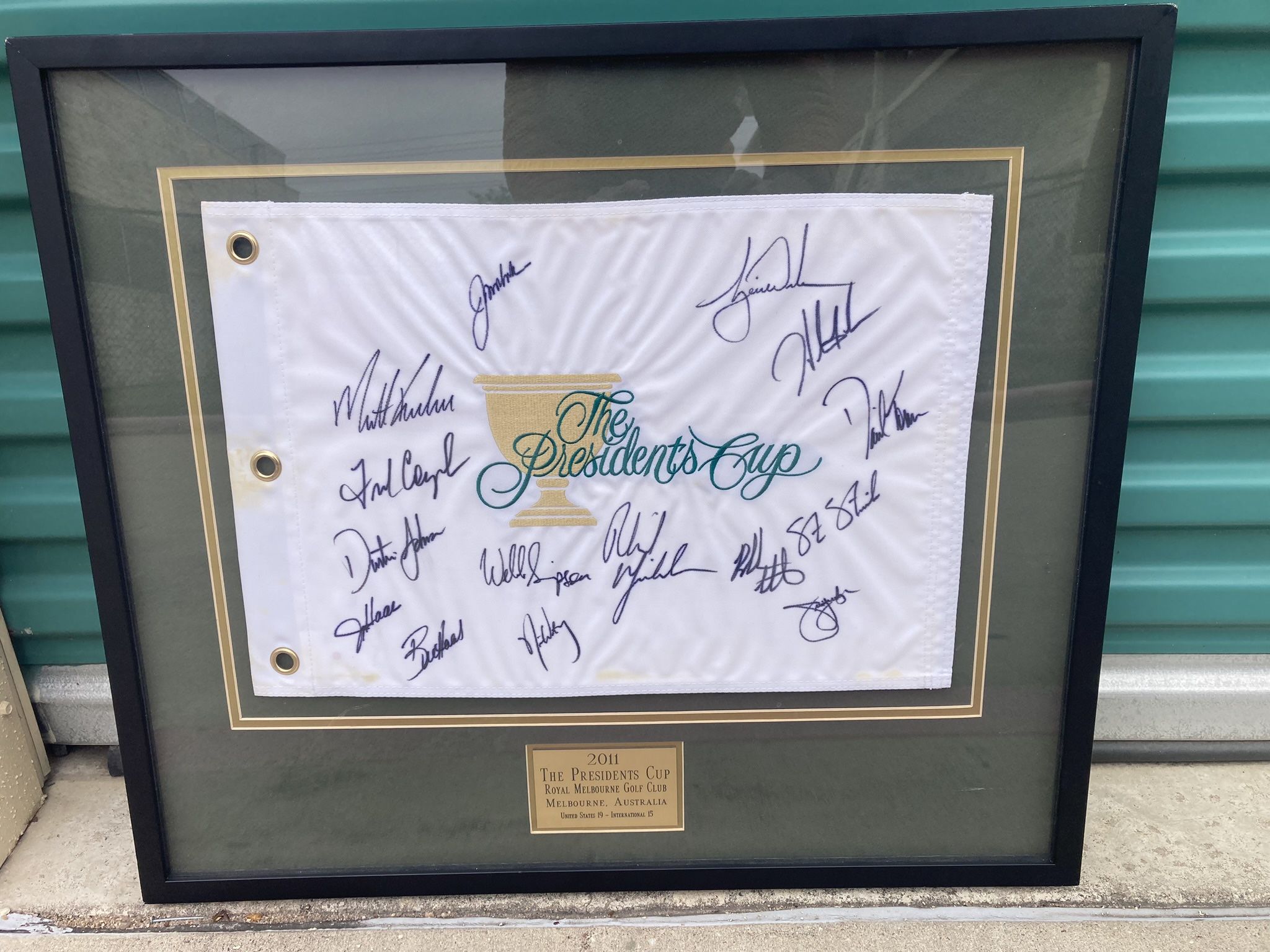2011 President’s Cup Flag - Signed By Tiger Woods, Phil Mickelson, Dustin Johnson, Freddie Couples, Entire Team, Captains and Co-Captains