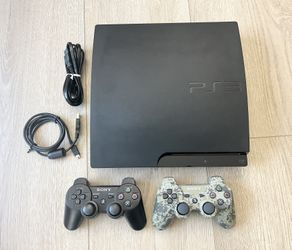PS3 Console and 2 controllers