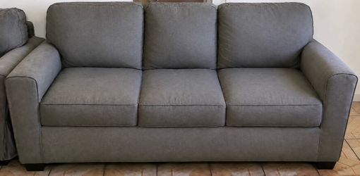 Price Very Negotiable - Gray Sofa