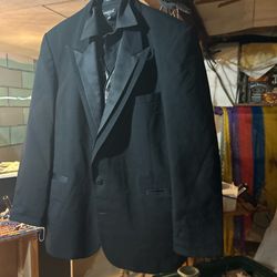 Bow tie Tuxedo With Black Button Up Dress Shirt , A Bluish Silver Vest And Black Suit Pants