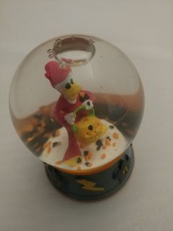 One Disney Donald Duck mini snow globe 2.5” tall.