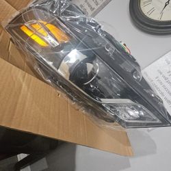 Brand-new, never installed left-side (driver side) headlight assembly for 2014 Chevrolet Impala LT. Still in original plastic packaging. LED headlamp