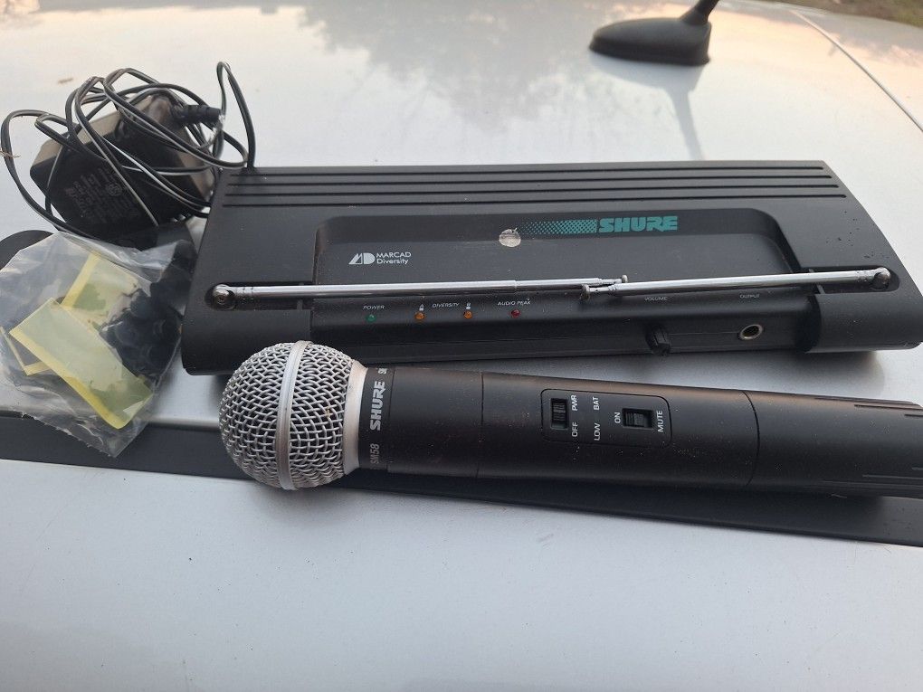 SHURE WIRELESS MICROPHONE SYSTEM.